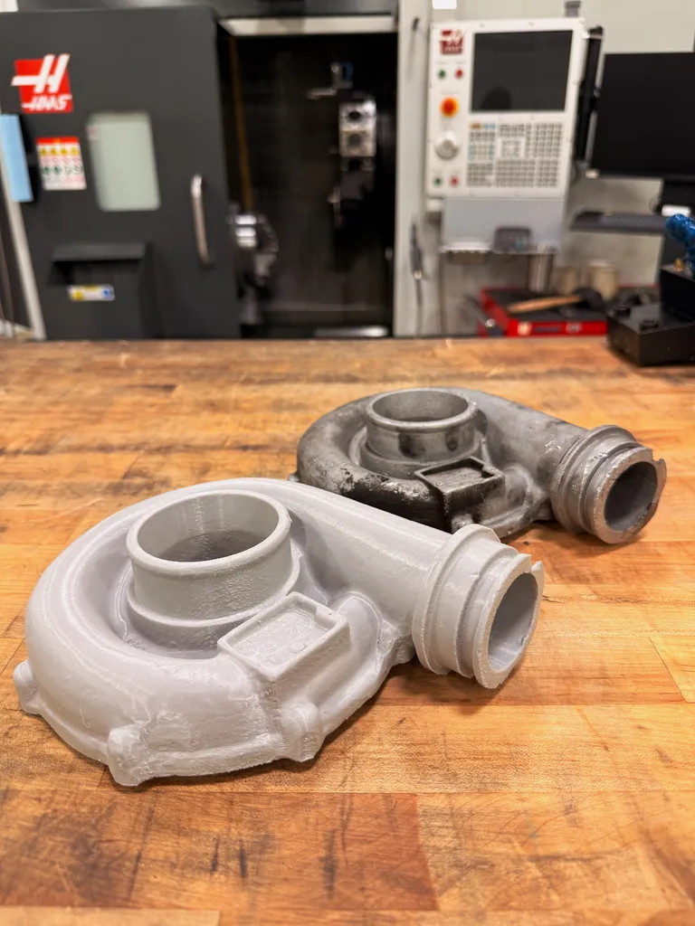 3D printed turbo housing replica next to original part